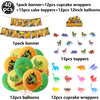 A set of dinosaur cake toppers, banner, balloons, and cupcake wrappers for a party.