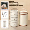 A set of three white portable insulated stainless steel lunch boxes and tableware with insulation bags