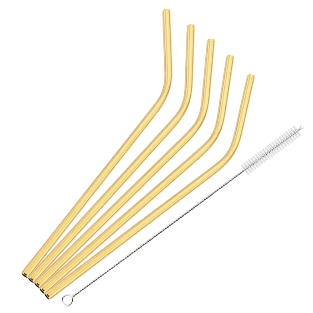 A set of six thin, gold-colored reusable stainless steel drinking straws arranged diagonally.