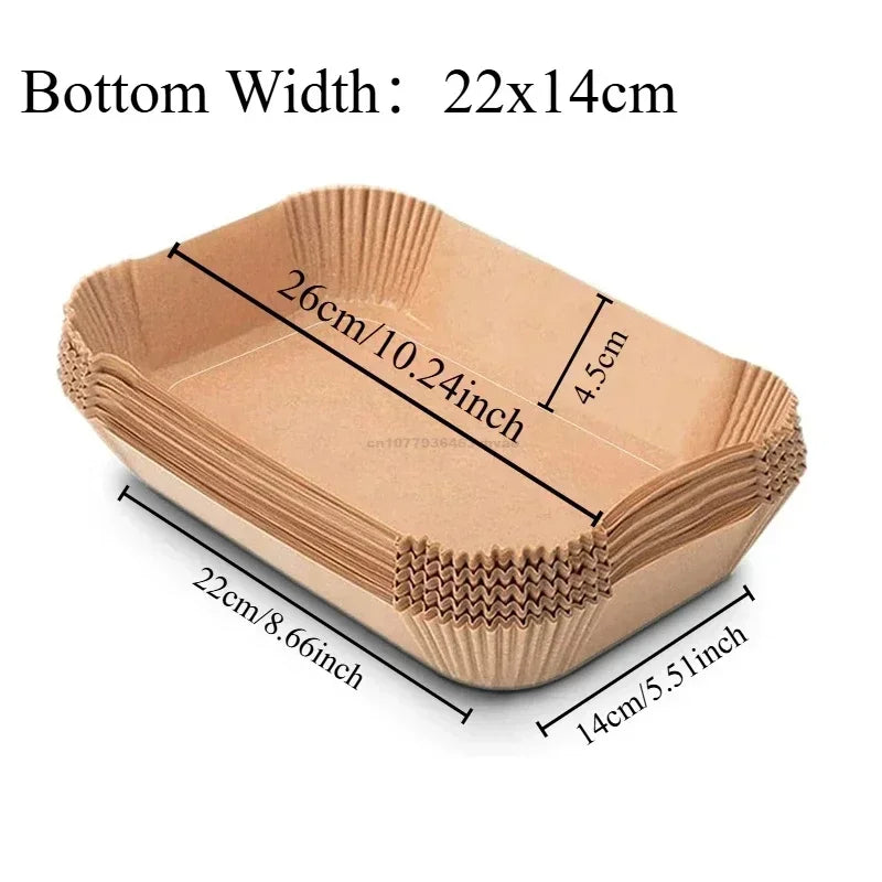 Disposable non-stick cooking liner with dimensions 26cm long by 14cm wide