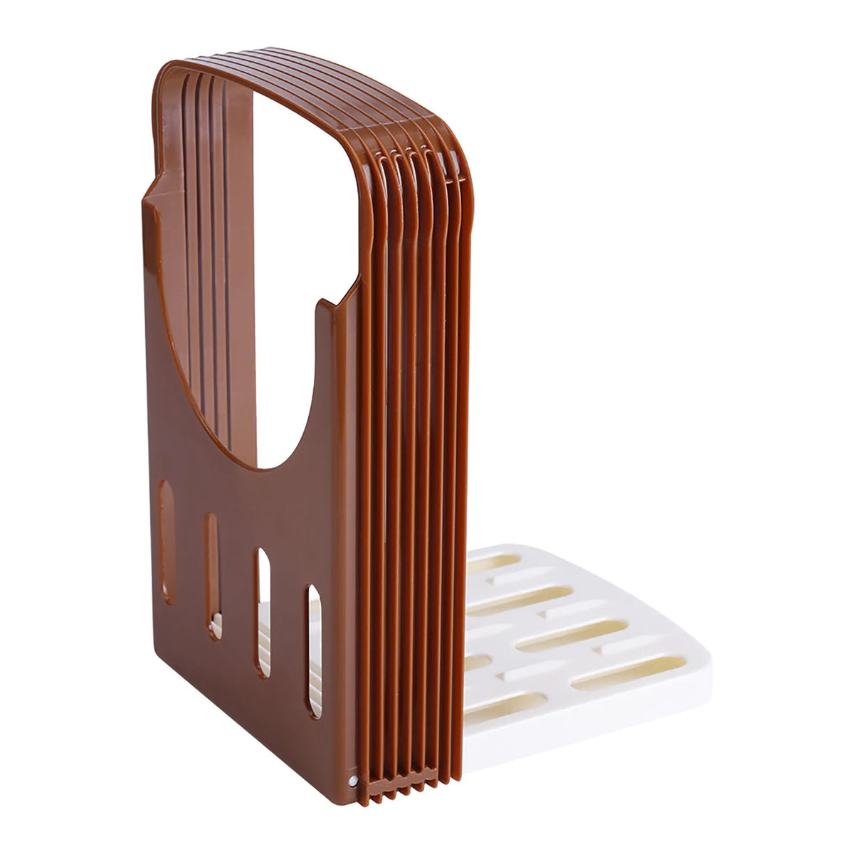 A brown foldable ceramic bread and toast cutter with vertical ridges and a white cutting plate.