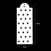 A white plastic cake stencil set with the number 19 and multiple stars.