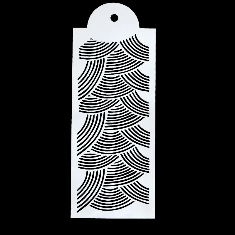 A white stencil featuring a repeating pattern of curved, overlapping lines for cake decoration.