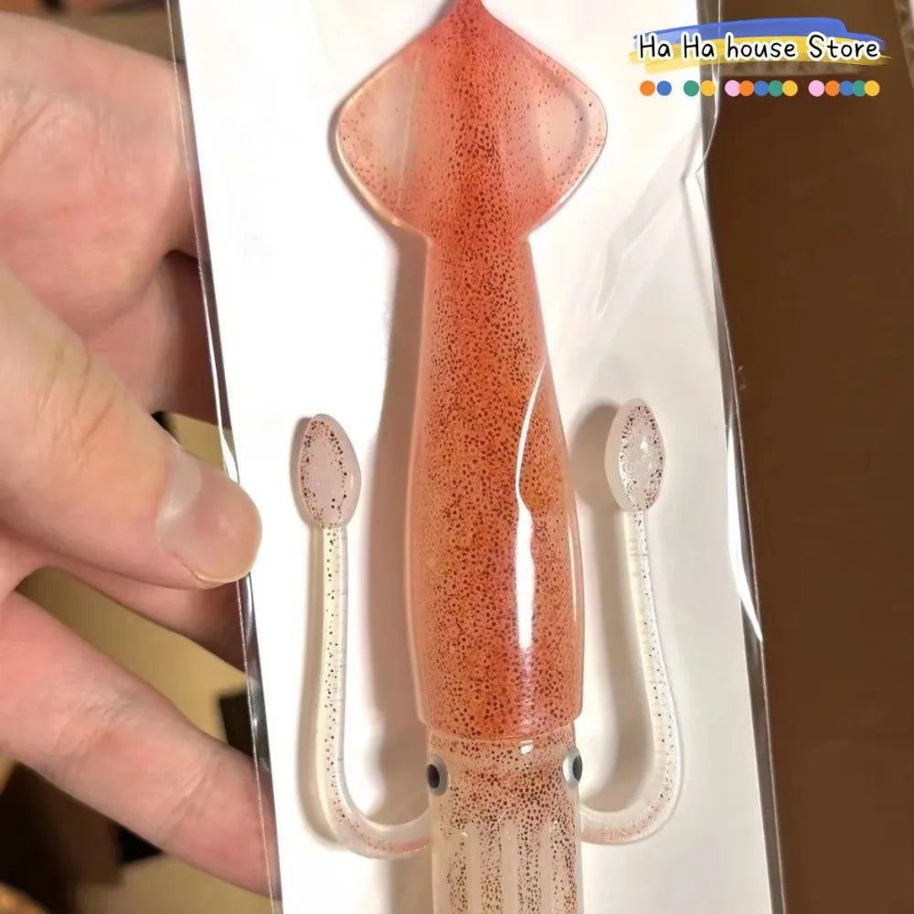 A set of funny squid cuttlefish themed tableware forks in a clear plastic package.