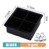 Black silicone ice cube tray with a 4 grid design, measuring 11.5cm by 5cm.