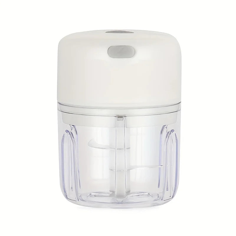 A clear plastic mini rechargeable garlic chopper and meat grinder with a white top cap.