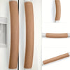 Close-up view of faux leather refrigerator door handle covers in tan color, showing various styles and finishes.