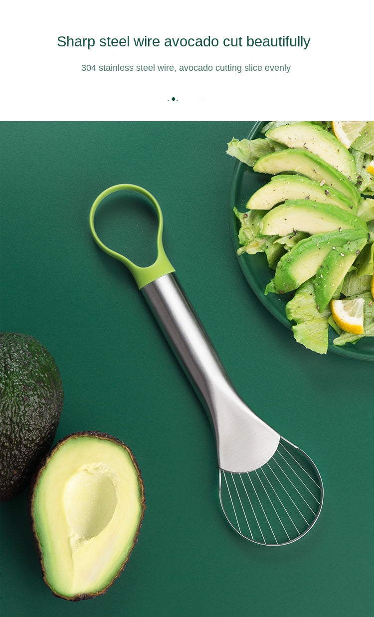 A stainless steel avocado cutter is shown next to sliced avocados on a green background.
