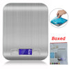 A silver digital kitchen scale with a square design and a blue protective cover shown next to its box.