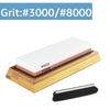 A set of dual-sided knife sharpening stones labeled Grit #3000 and #8000, resting on a wooden base.