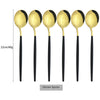 A set of five gold-colored dinner spoons with black handles and a 22cm length.