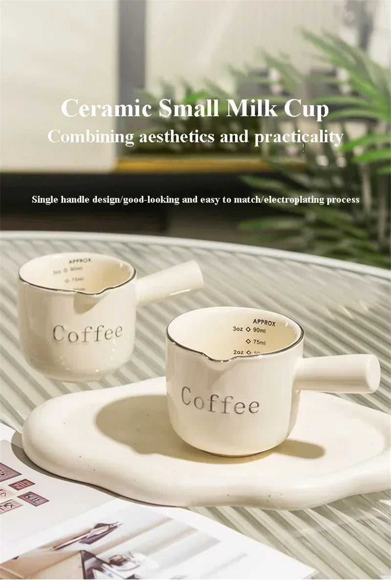 A white ceramic small milk cup set featuring a single handle design for coffee