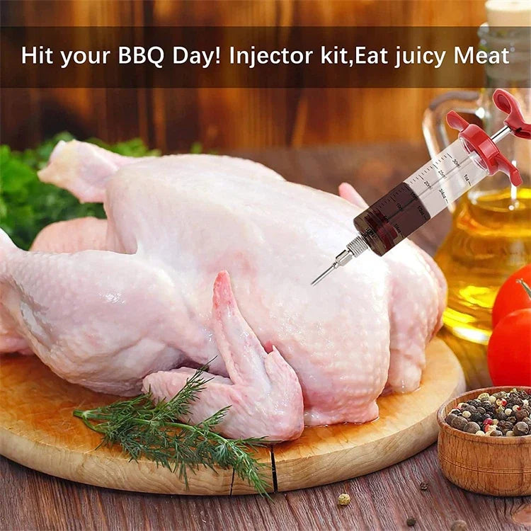 A raw chicken is shown next to an injector kit and a bottle of oil, ready for BBQ.