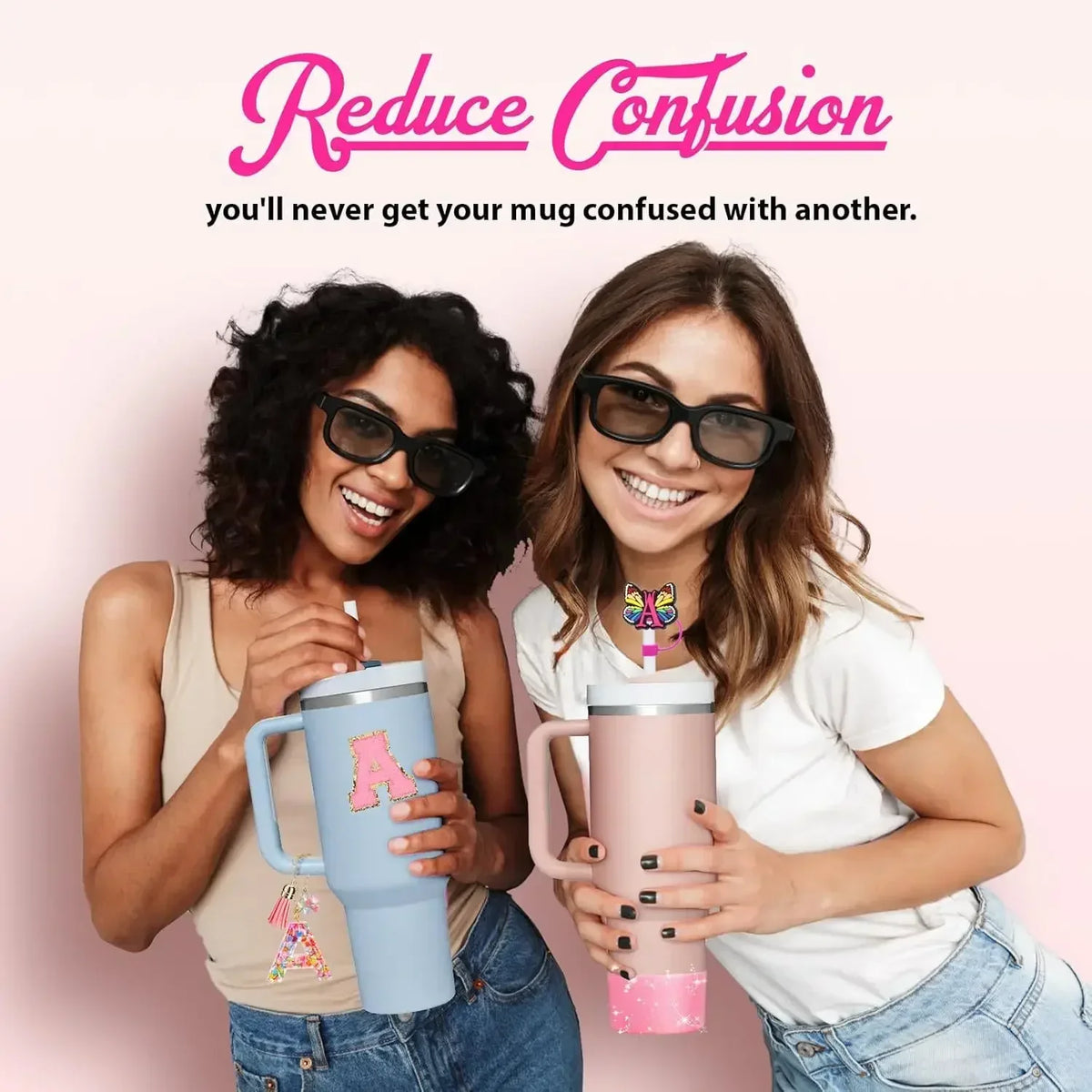 Two women smiling while holding pink and blue silicone straw covers for tumblers