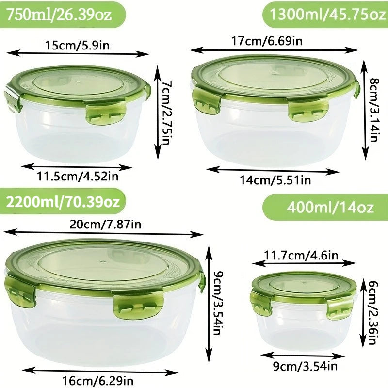 A set of stackable airtight food storage containers in clear and light green plastic.