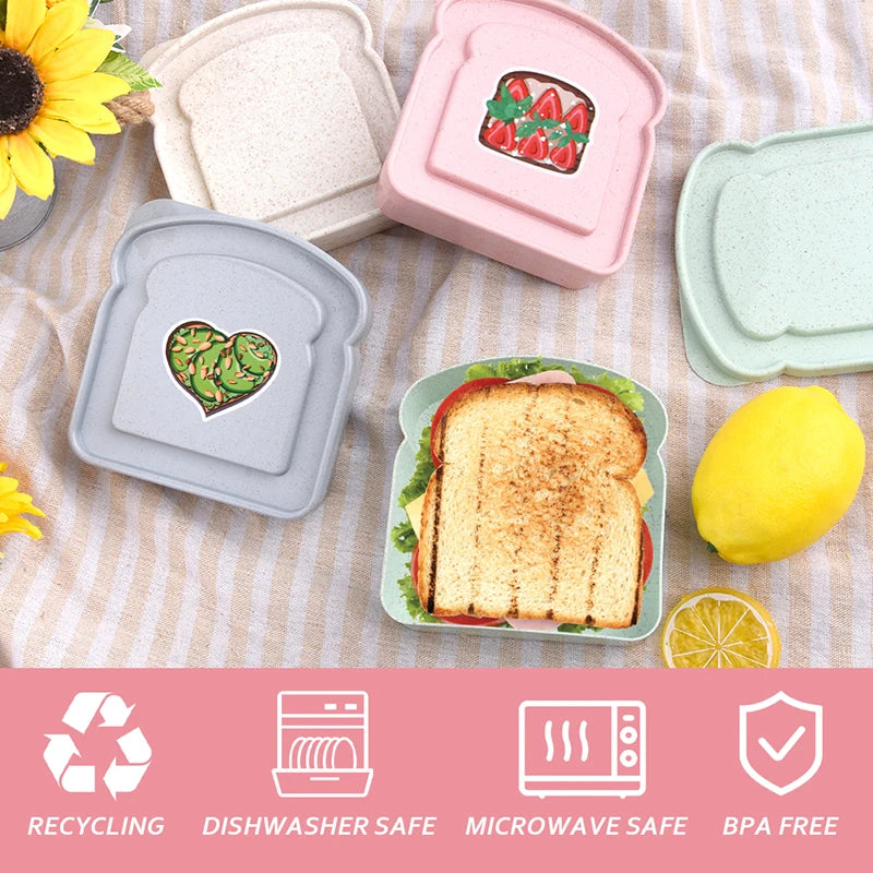 A set of reusable pink and gray silicone sandwich containers for food storage and meal prep.