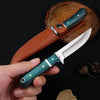 A heavy-duty utility cleaver knife with a wooden handle is shown being held over a dark background.