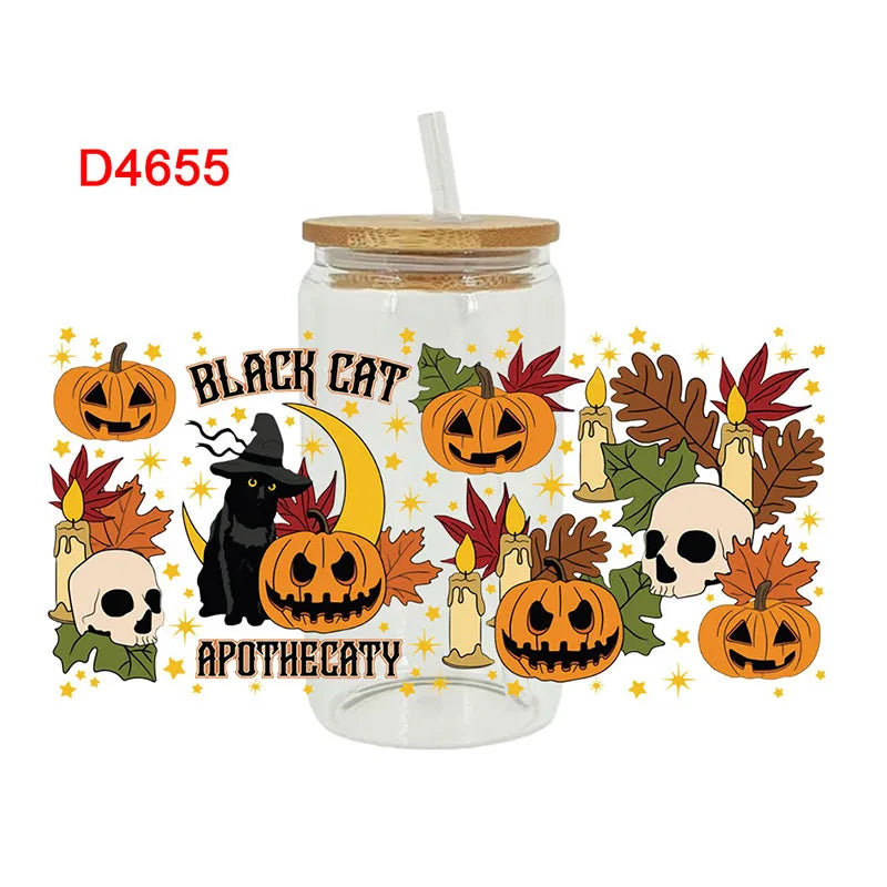 A glass jar with a straw containing a Halloween-themed design featuring a black cat, pumpkin, skull, and autumn leaves.