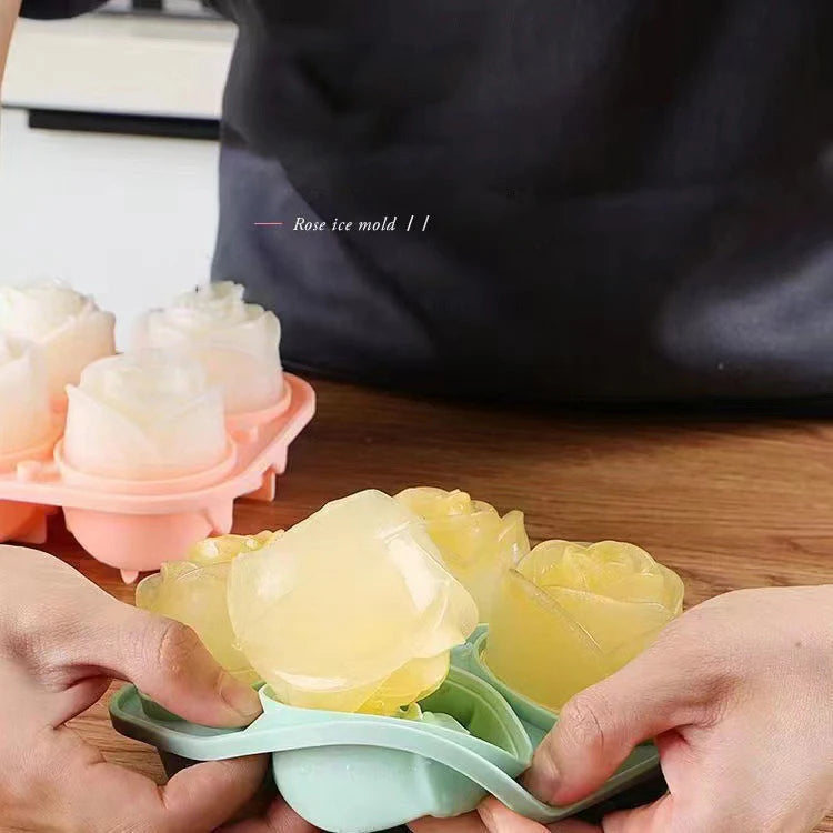 Hands holding a light yellow rose ice mold used for making drinks or DIY crafts.