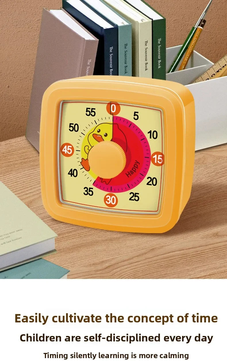 An orange visual timer with a circular dial showing time and a happy face, placed on a wooden desk next to books.