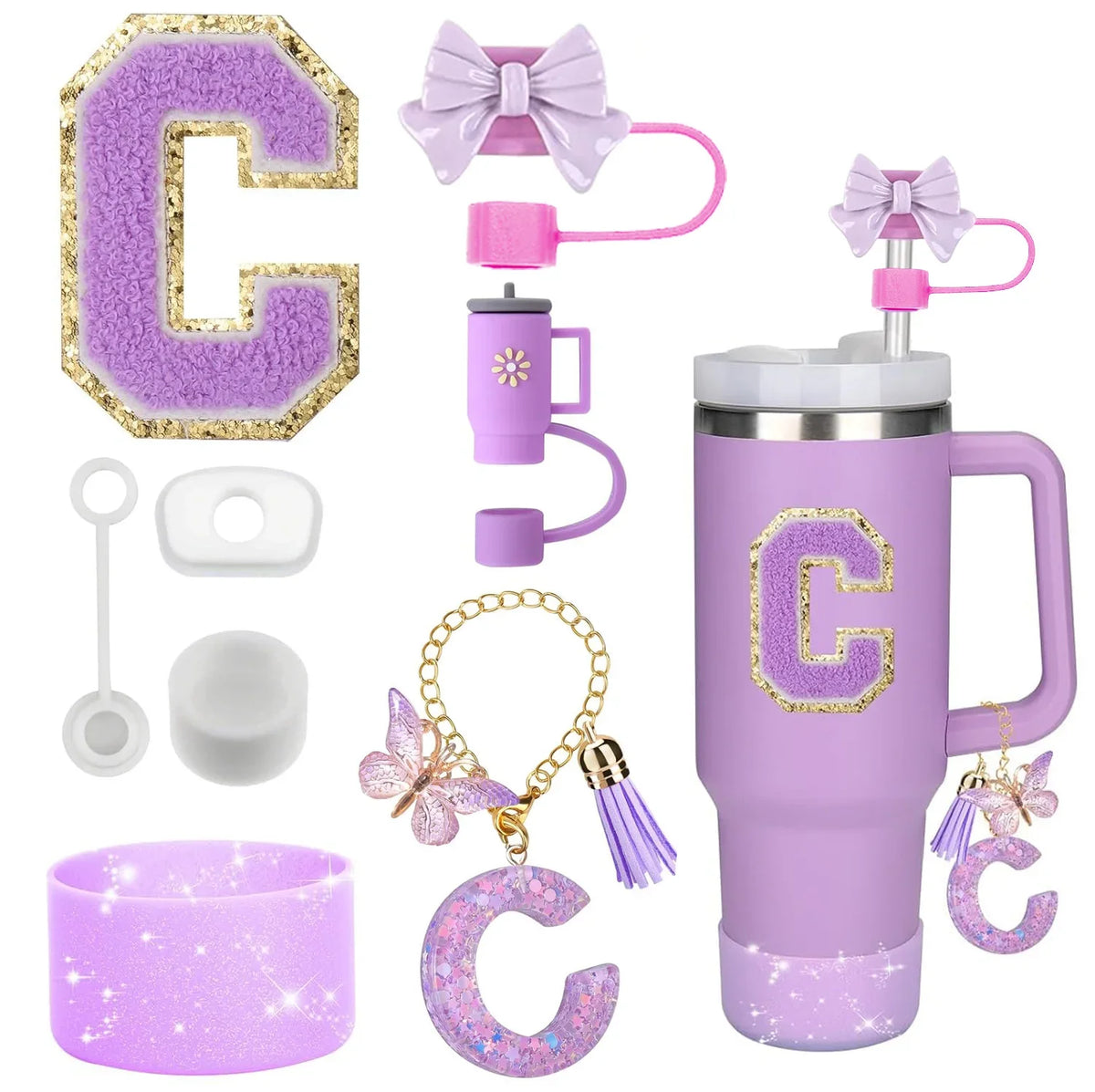 A set of purple silicone straw toppers and accessories for tumblers, including a bow, stirrer, and letter charms.
