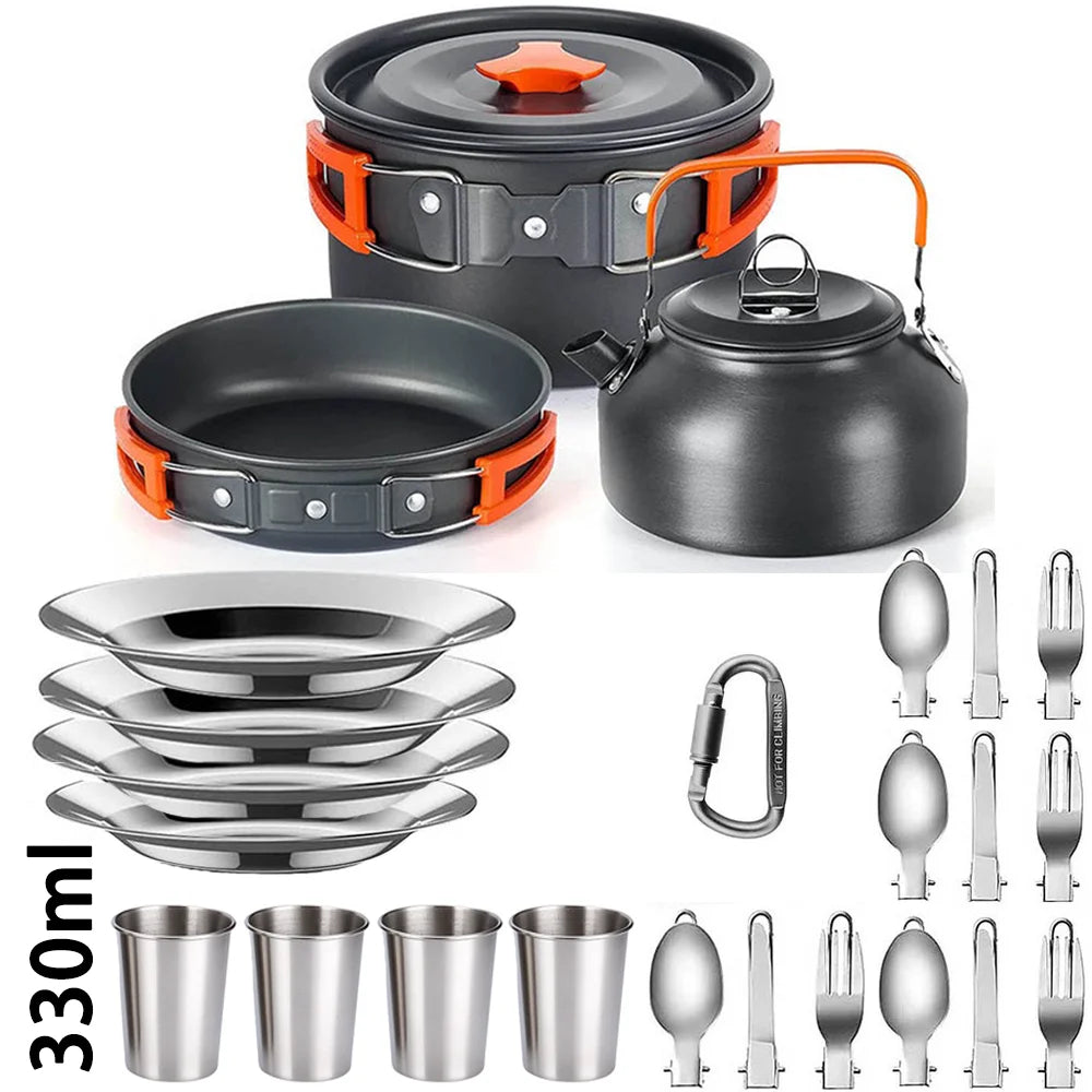 A set of camping cookware including a pot, lid, and multiple frying pans and cups.