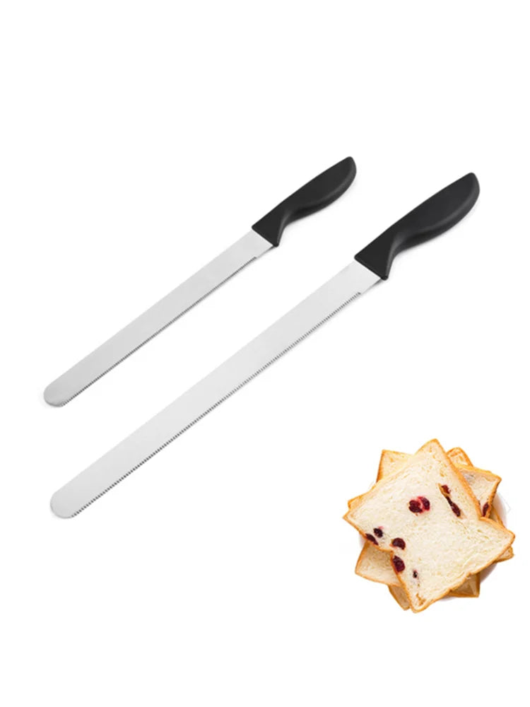 A pair of professional stainless steel bread and cake slicer knives lying next to sliced toast.