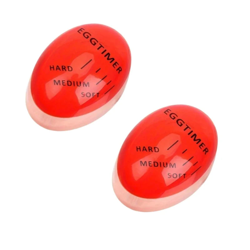 A red color-changing boiled egg timer with markings for hard, medium, and soft settings.