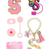 A set of silicone straw covers and accessories in pink and gold colors for tumblers.