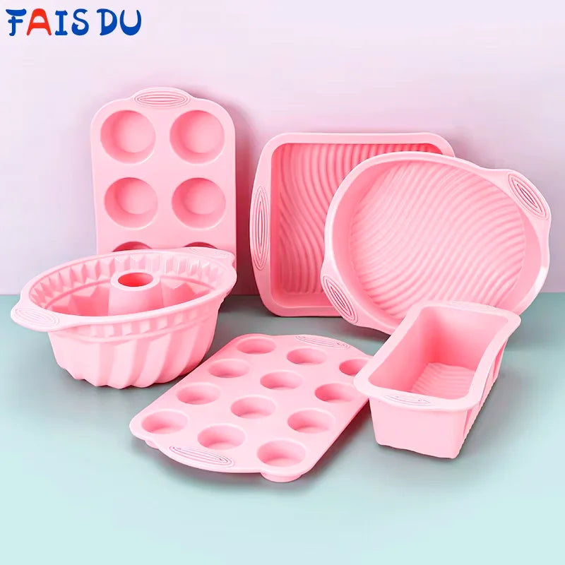 A pink nonstick silicone baking set featuring multiple molds and pans for cakes and desserts.