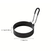 Black stainless steel egg ring set with a handle for breakfast cooking