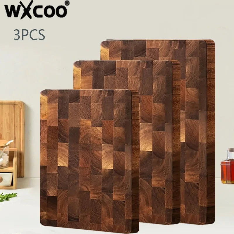 Three pieces of dark brown acacia wood cutting boards stacked and displayed on a light surface.