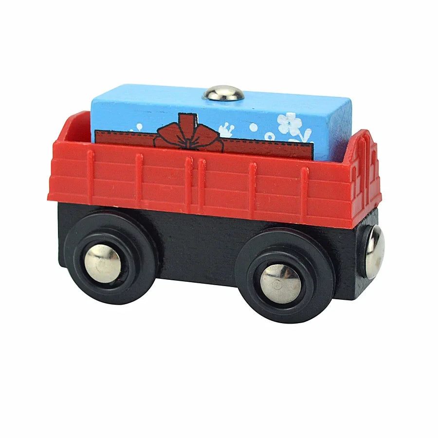 A red wooden magnetic train car set with a blue box on top.