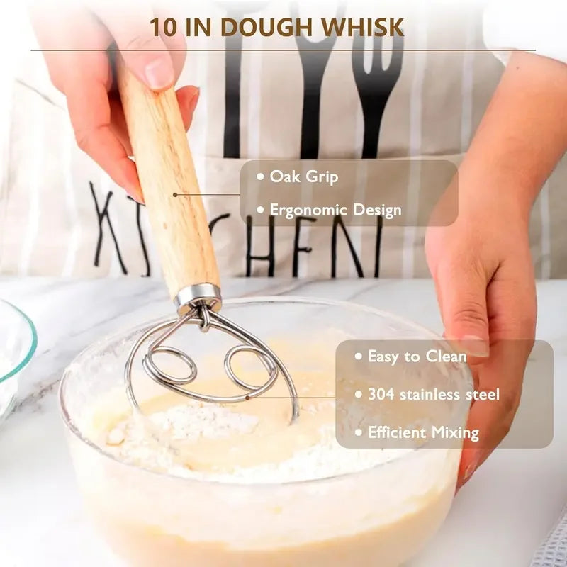 A hand uses a wooden whisk to mix liquid in a glass bowl, demonstrating the 10 in dough whisk tool.
