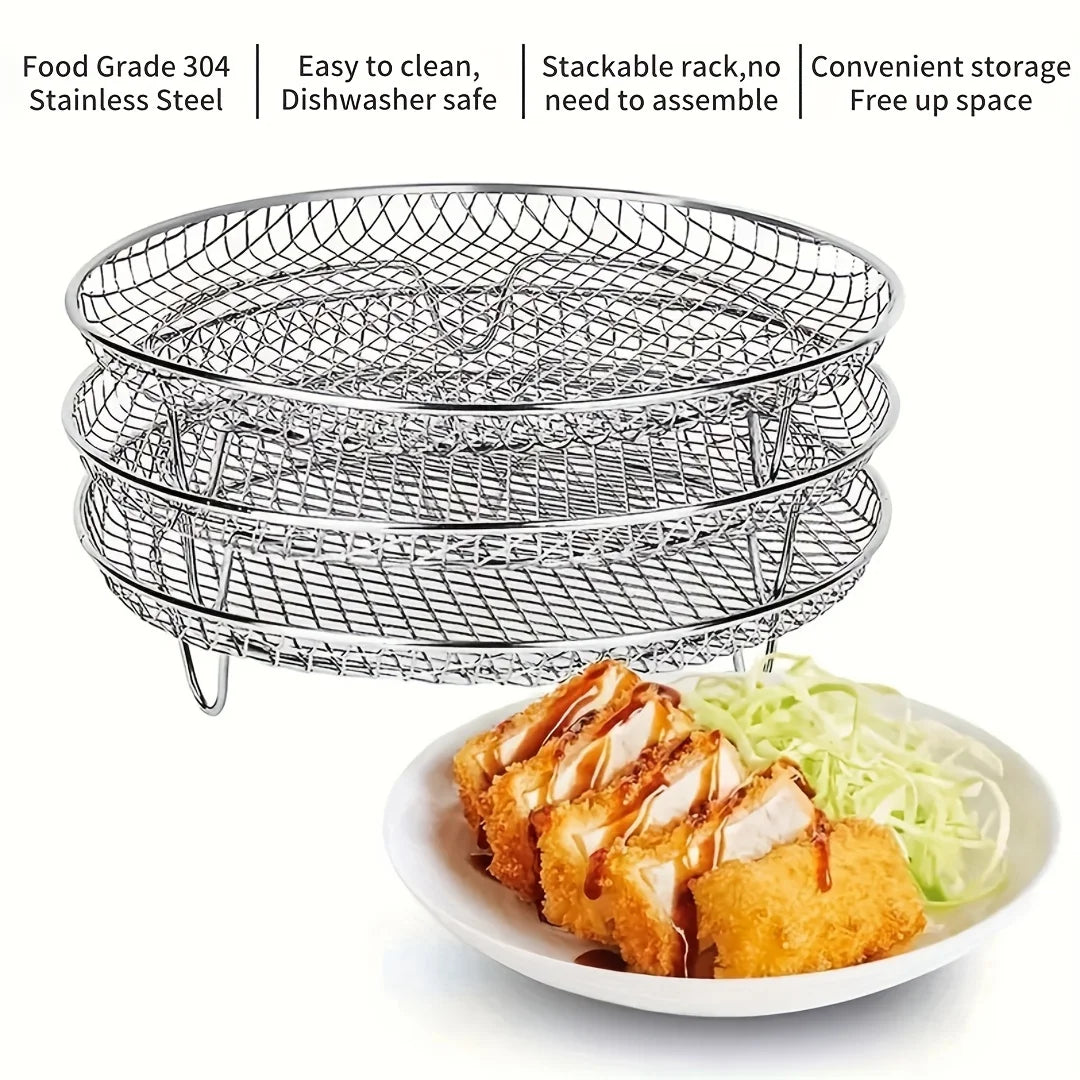 Stackable stainless steel grill rack for ovens and fryers shown in a stack on a white plate