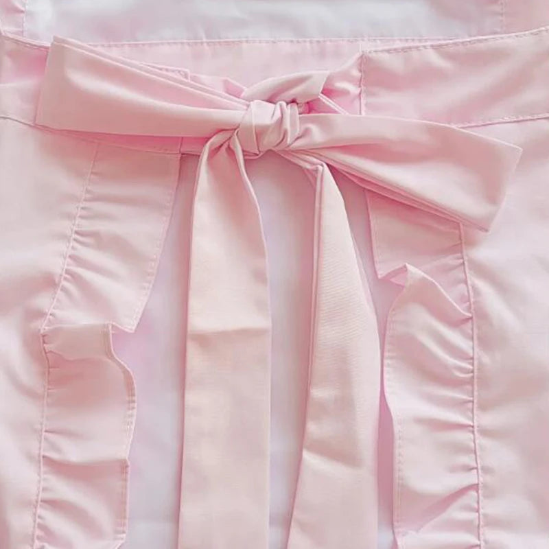 Pink princess heart bow apron for salon and home use with a tie closure