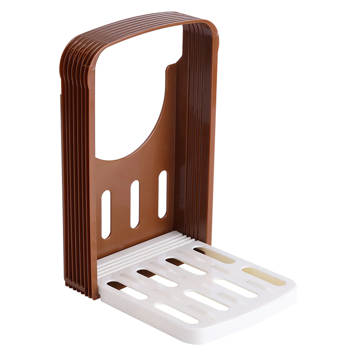 A brown foldable ceramic bread and toast cutter with a white base and slots for slicing.