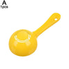 A yellow non-stick rice ball spoon mold with a handle.