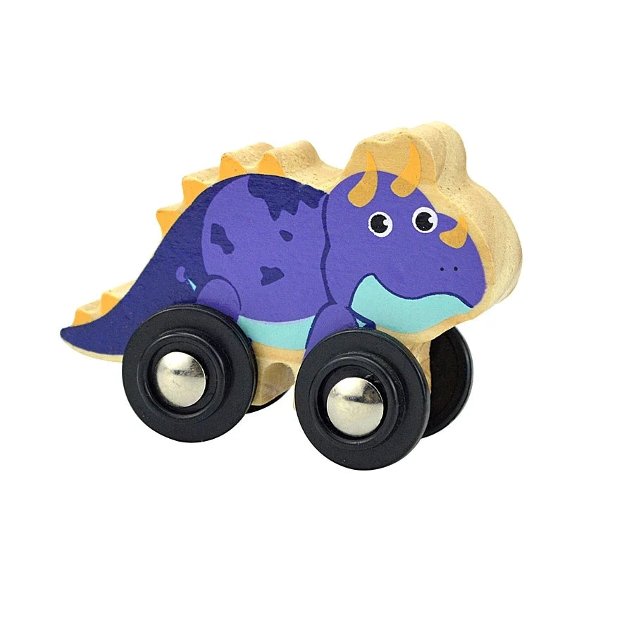 A wooden magnetic train car shaped like a purple dinosaur with yellow spikes and black wheels.