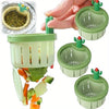 A green automatic cactus sink drain strainer is shown with various fruit and vegetable pieces draining into it.