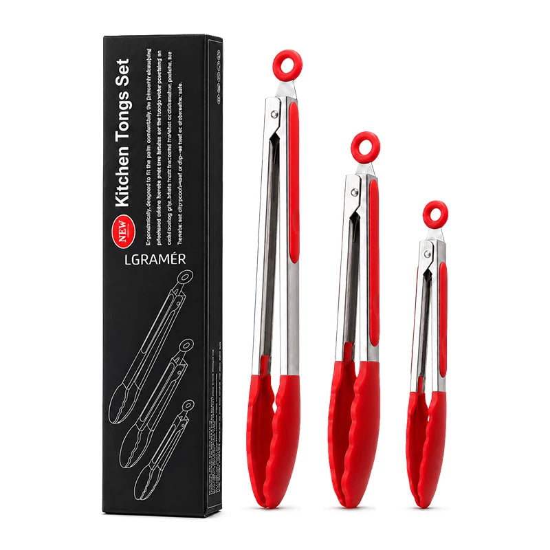 A set of three stainless steel kitchen tongs with red silicone grips displayed in a black box.