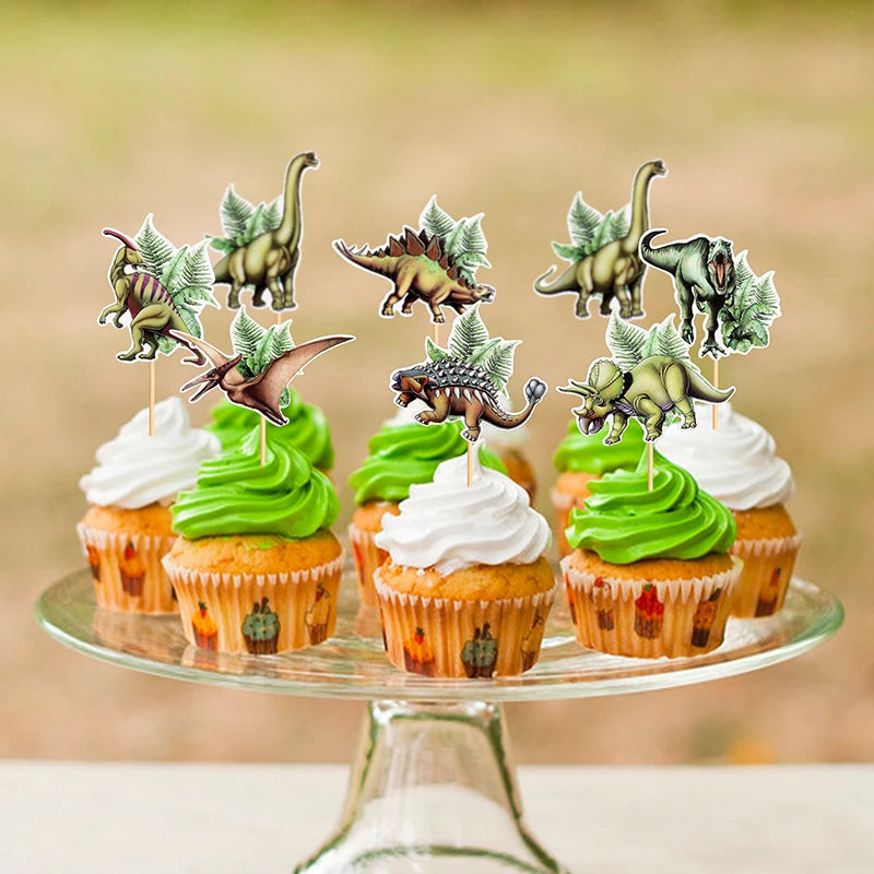 A set of dinosaur-themed cupcake toppers featuring various dinosaur silhouettes and green foliage.