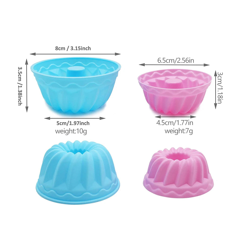 A set of two silicone baking molds, one blue and one pink, shown with dimensions.