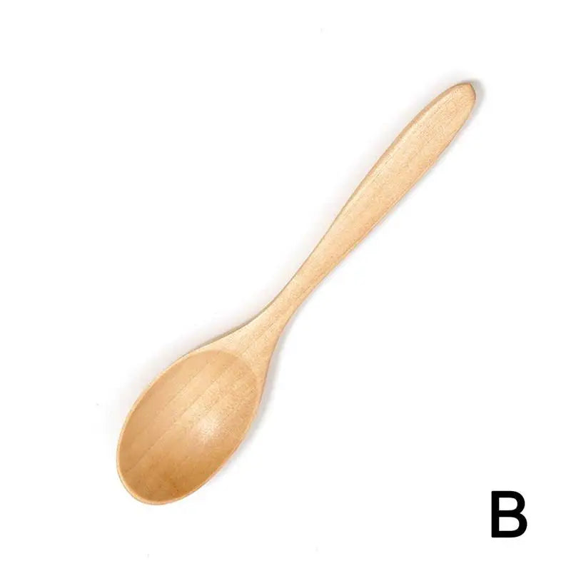 A light natural wooden cooking spoon shown from the side.