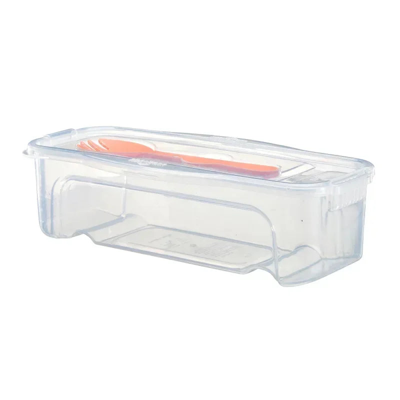 Clear plastic container with a silicone spatula inside, part of a microwave noodle and salad cooker set.